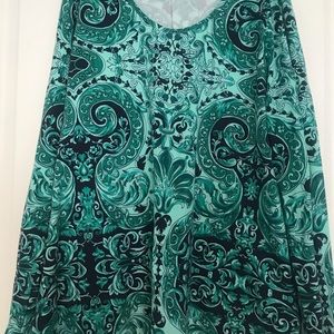 Printed top with back pleat detail. Teal and blue